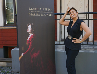 Marinas Rebekas plakāts